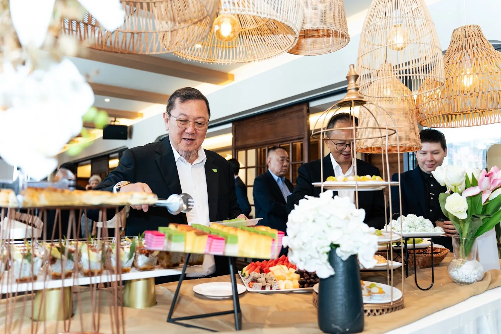 Guests at a corporate buffet reception