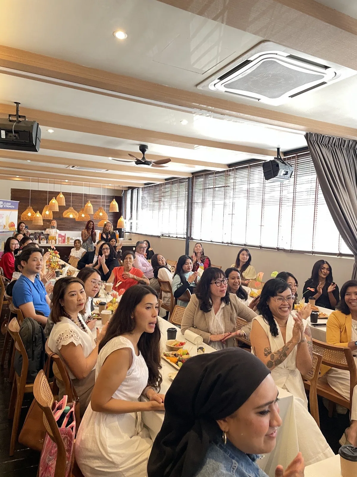 Monstera Hall filled with guests for a talk